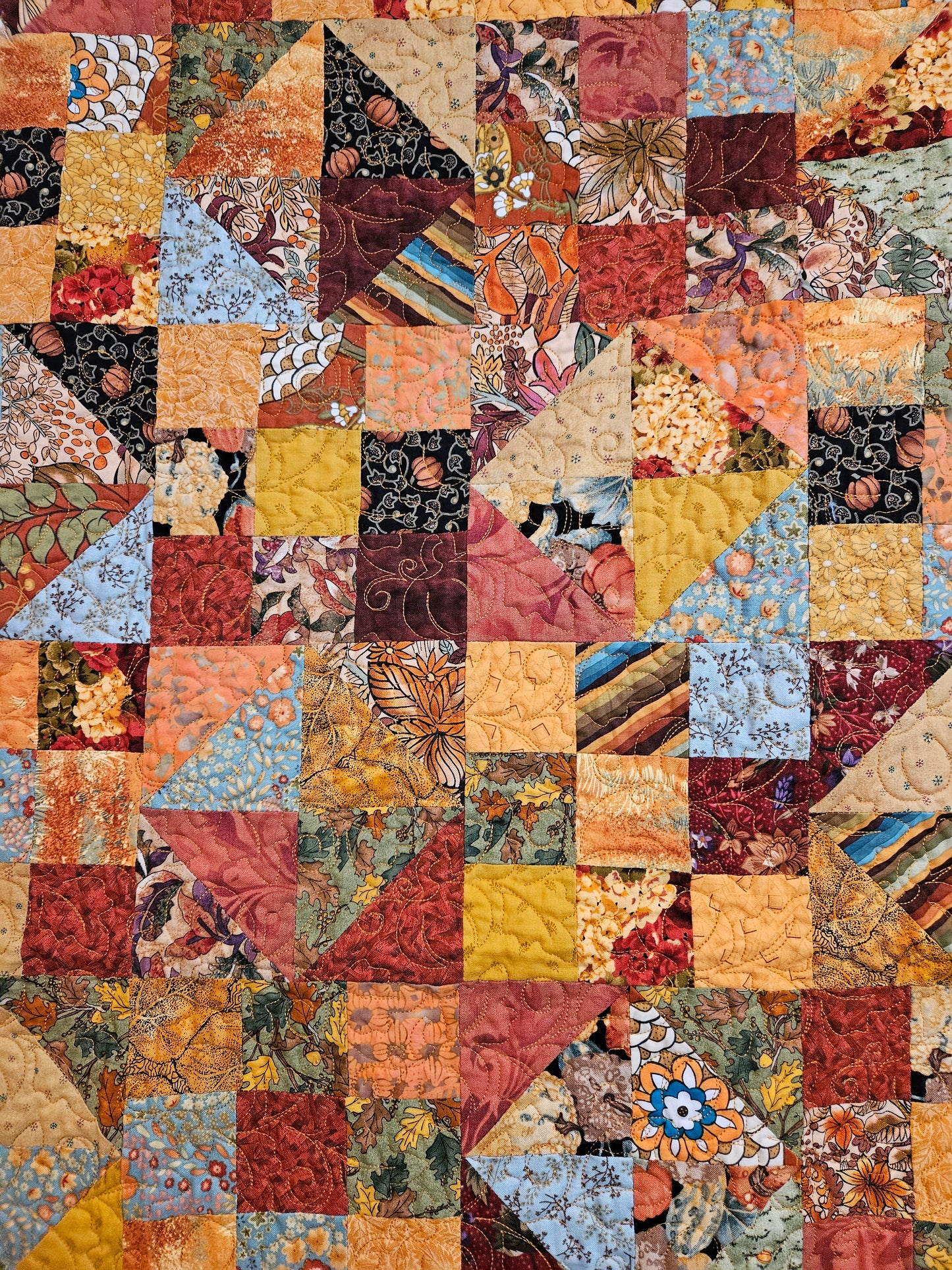 close up of 9 patches and half square triangles.