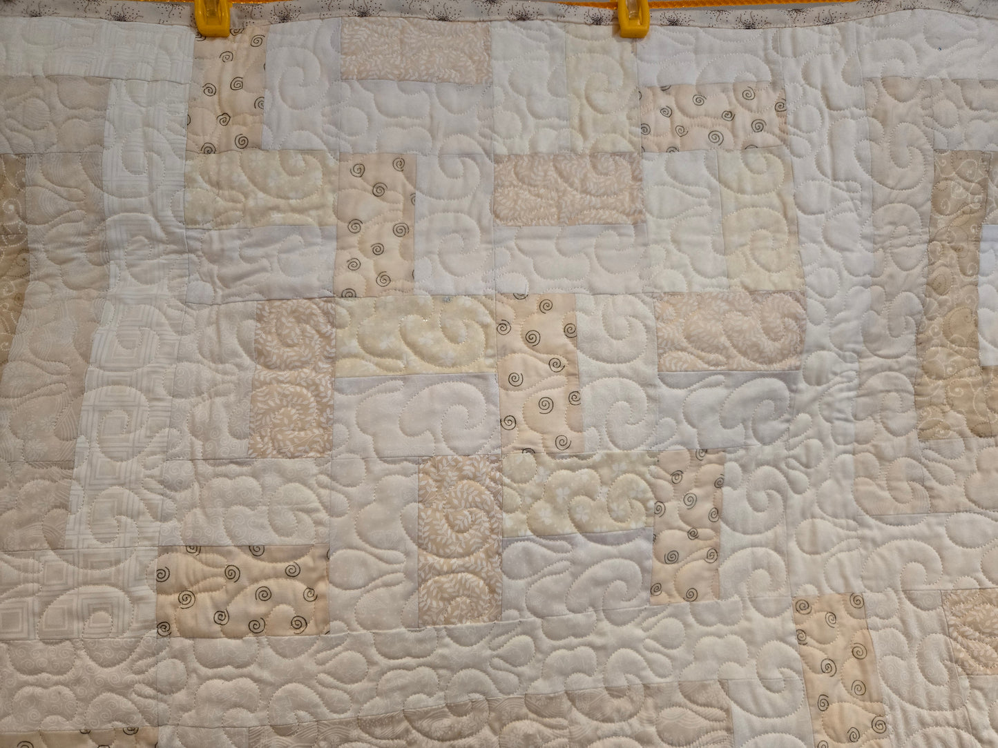 This shows one of the rail blocks up close. You can clearly see the quilting.