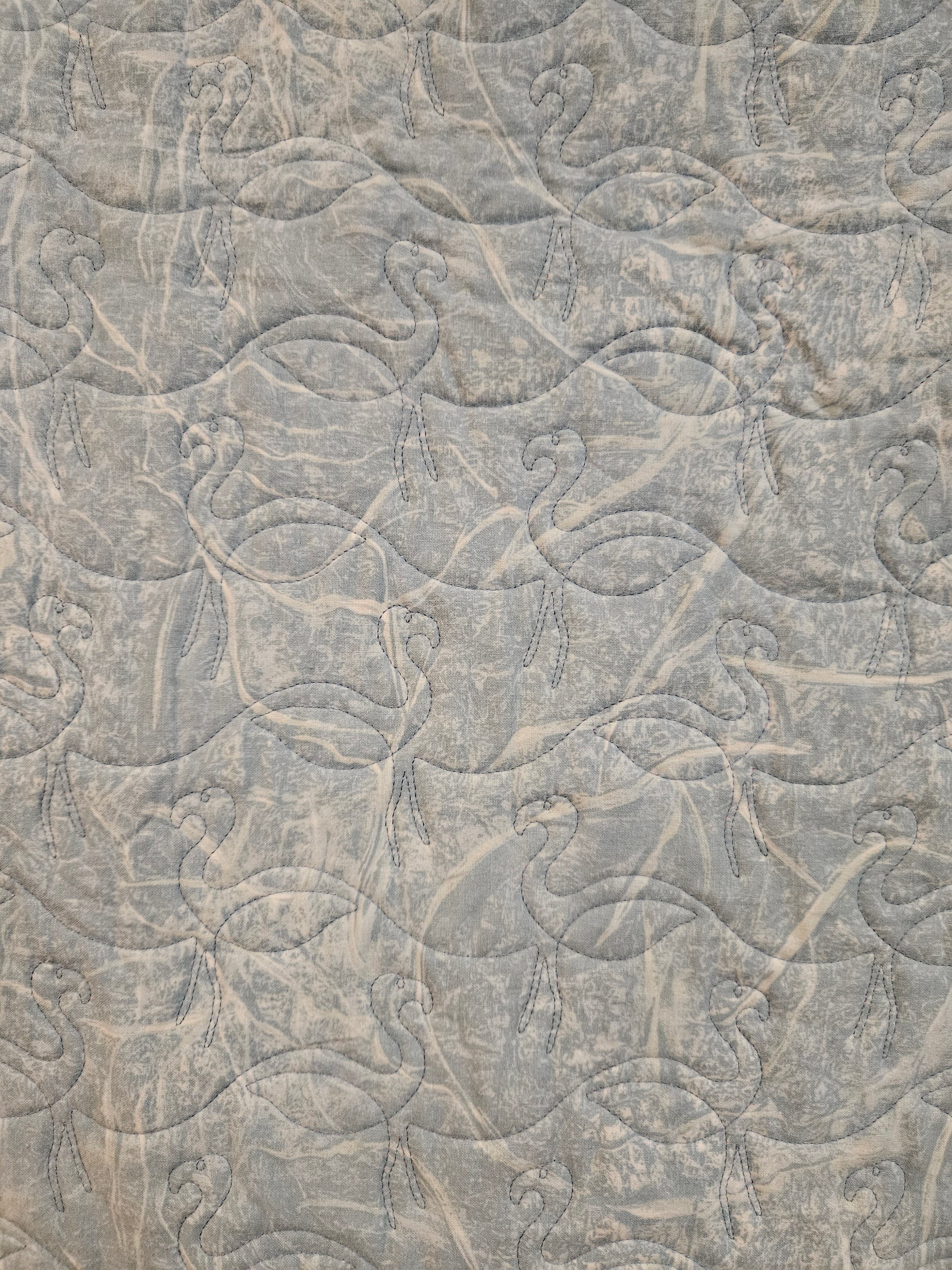 Back of a flamingo quilt.  The backs are the same on both.